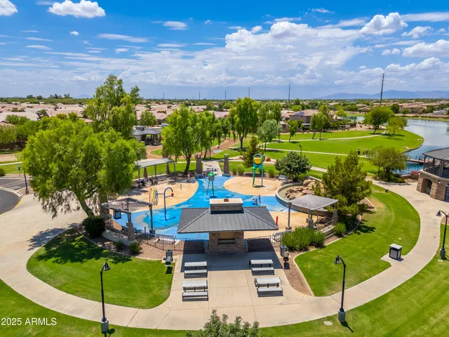 a swimming pool with an outdoor seating