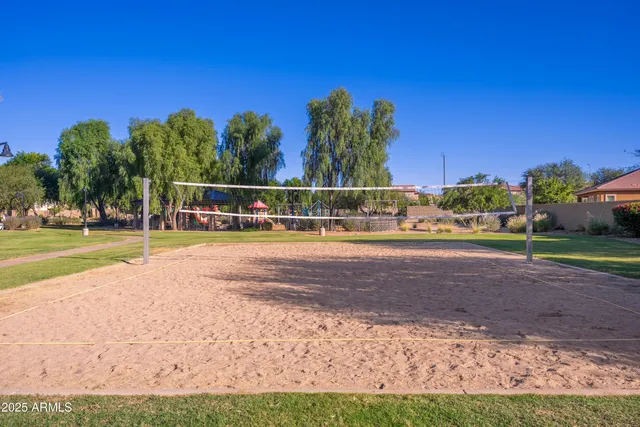 a view of chairs and tables in the patio
