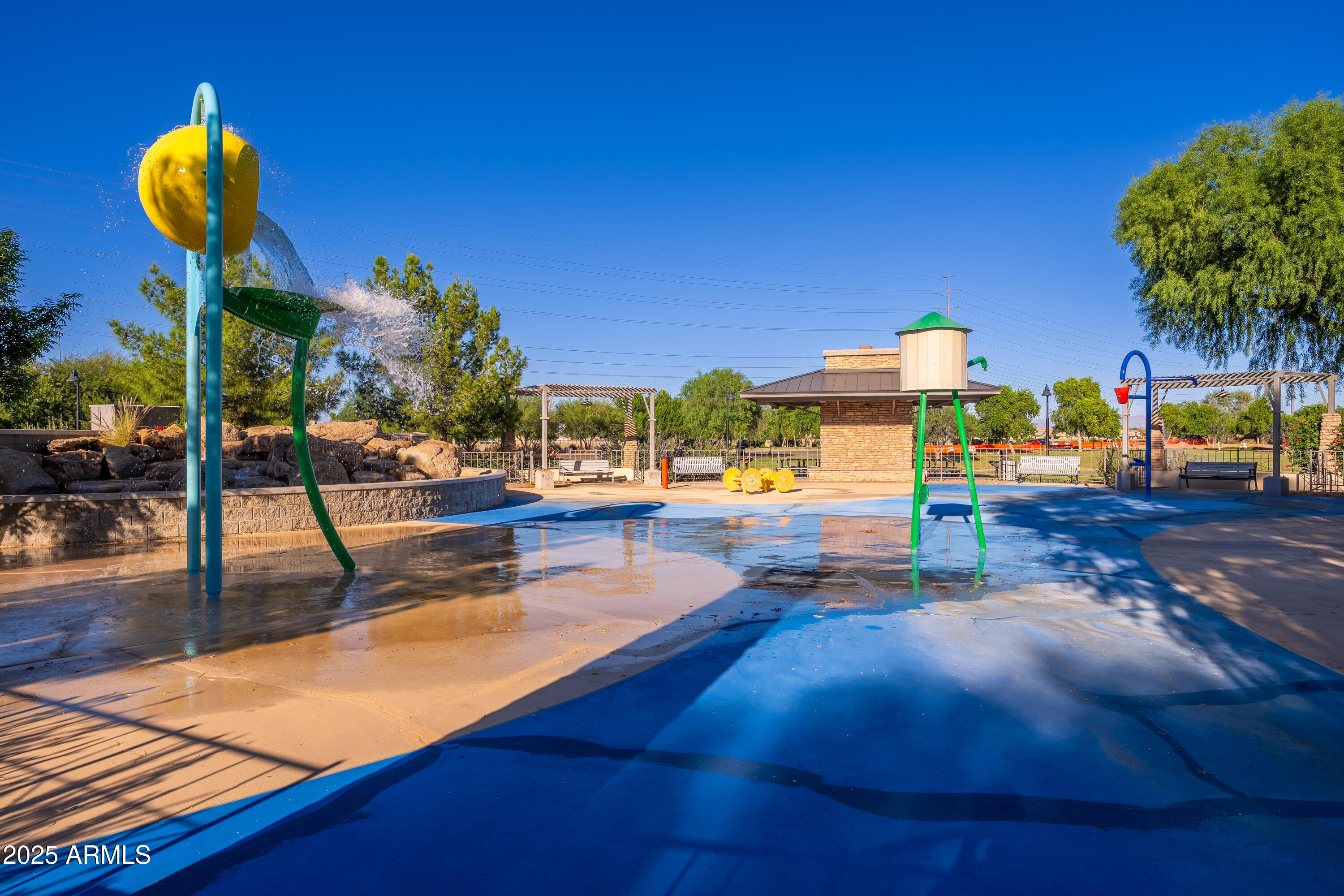 724 East Lark Street, Unit 102 Gilbert, AZ 85297 - Photo 43 of 54 a view of a swimming pool with a patio