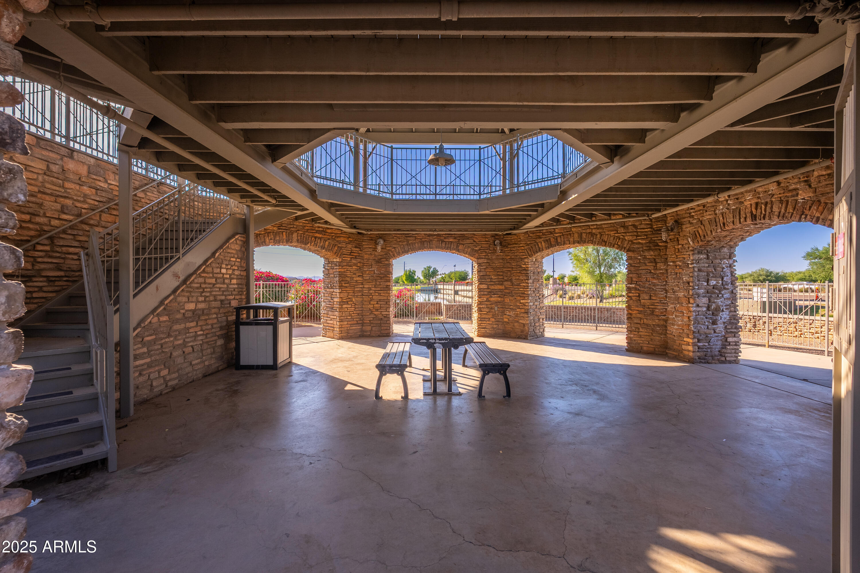 724 East Lark Street, Unit 102 Gilbert, AZ 85297 - Photo 44 of 54 a view of hall with a couch and wooden floor