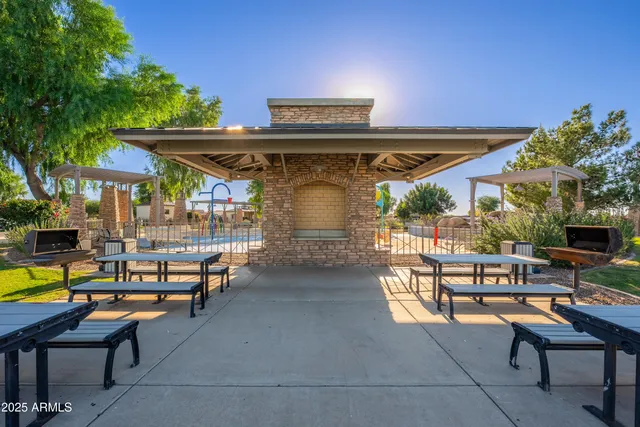 a view of swimming pool with an outdoor space and seating area