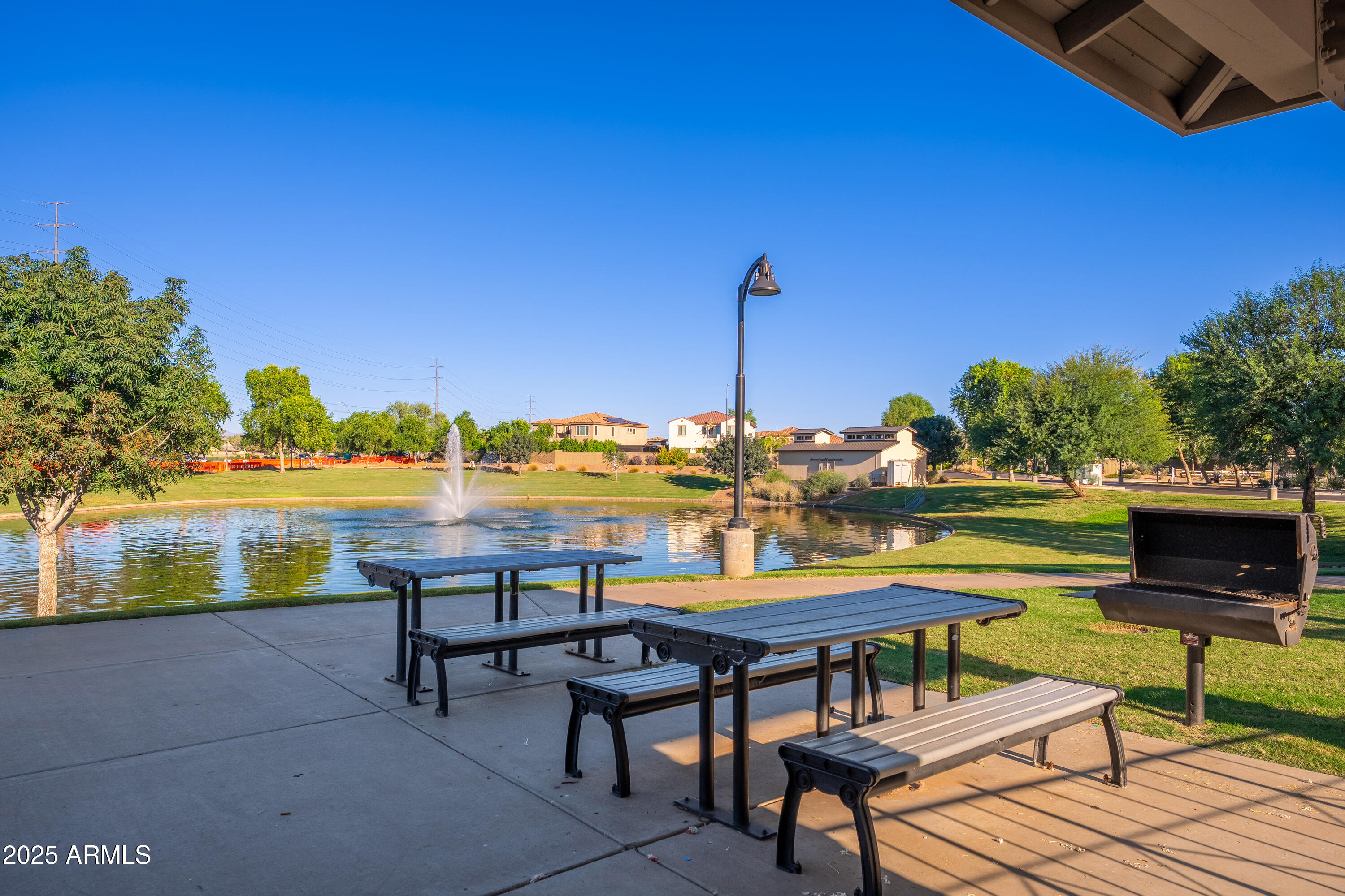 724 East Lark Street, Unit 102 Gilbert, AZ 85297 - Photo 47 of 54 a view of a terrace with chairs