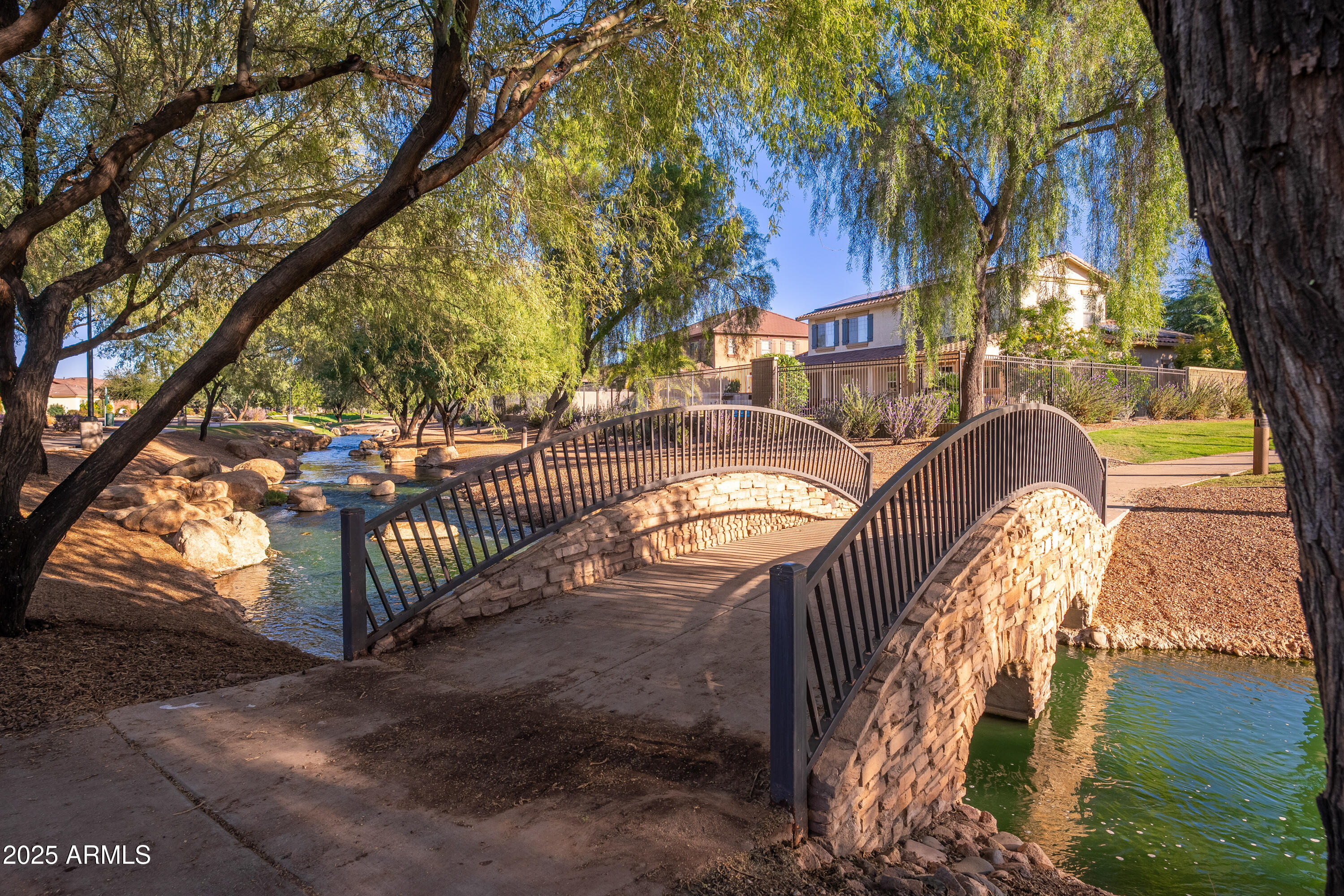 724 East Lark Street, Unit 102 Gilbert, AZ 85297 - Photo 49 of 54 a view of street along with trees