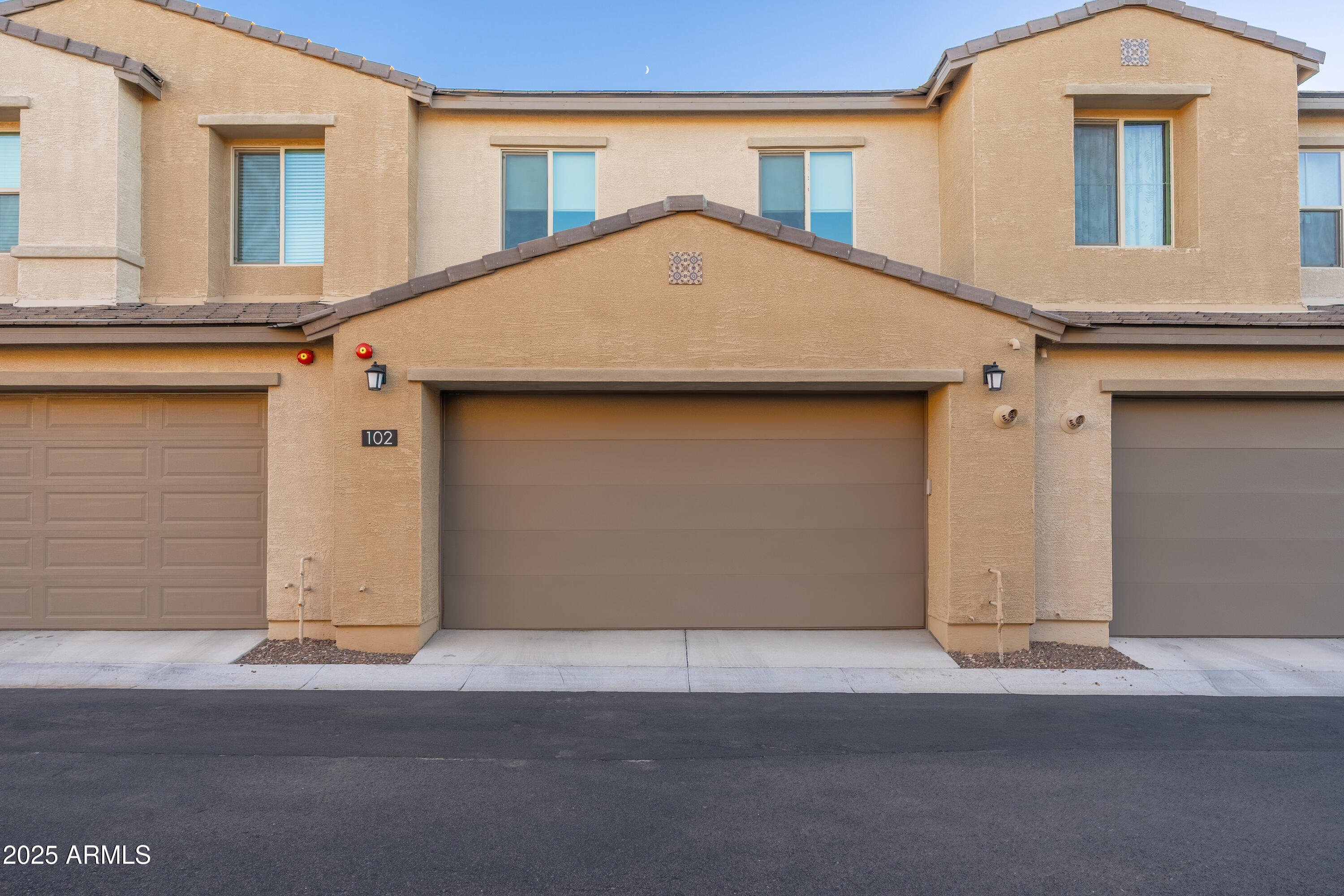 724 East Lark Street, Unit 102 Gilbert, AZ 85297 - Photo 7 of 54 a front view of a house