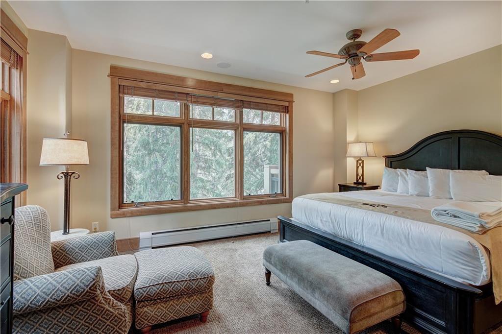 280 Trailhead Drive, Unit 3016 Keystone, CO 80435 - Photo 20 of 35 a bedroom with a bed couches and window