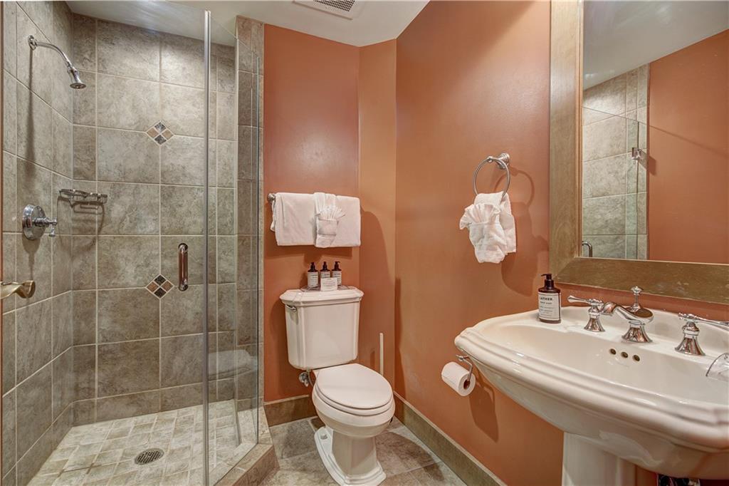 280 Trailhead Drive, Unit 3016 Keystone, CO 80435 - Photo 23 of 35 a bathroom with a sink toilet and shower