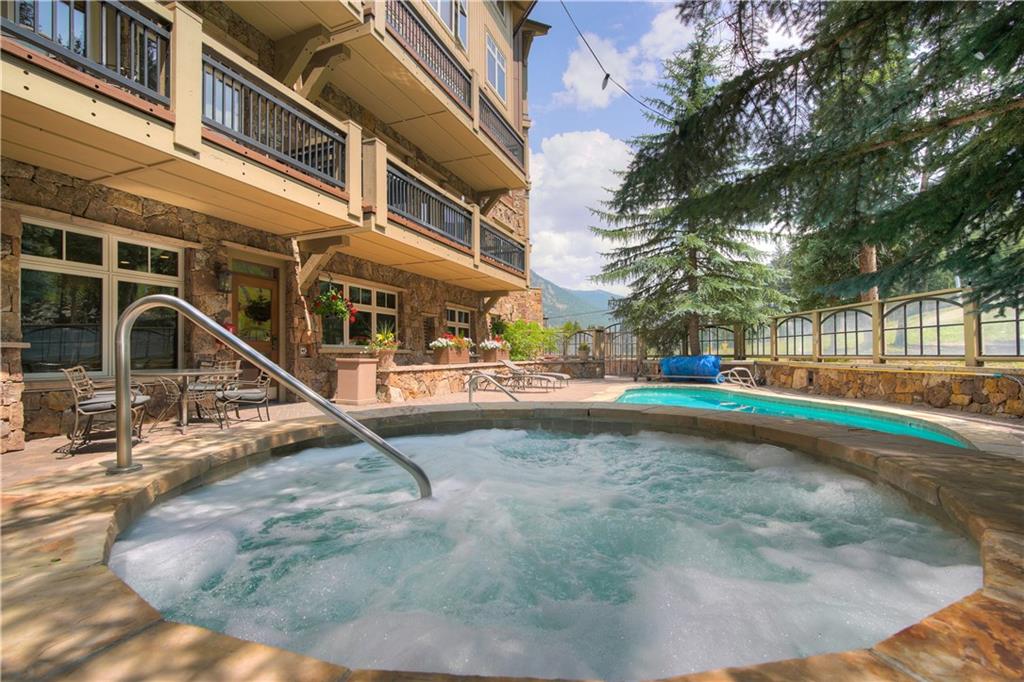 280 Trailhead Drive, Unit 3016 Keystone, CO 80435 - Photo 28 of 35 a view of a building with a park