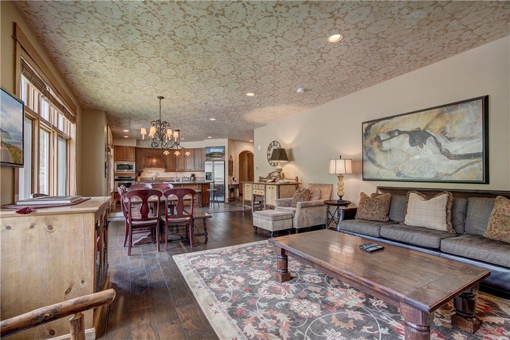 280 Trailhead Drive, Unit 3016 Keystone, CO 80435 - Photo 7 of 35 a living room with furniture and wooden floor