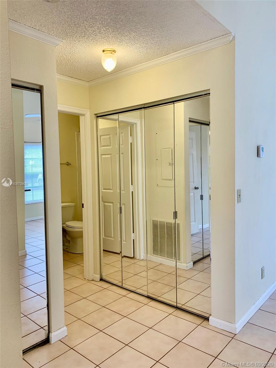 492 Hardwood Place, Unit 492 Boca Raton, FL 33431 - Photo 11 of 21 a bathroom with a shower and a sink