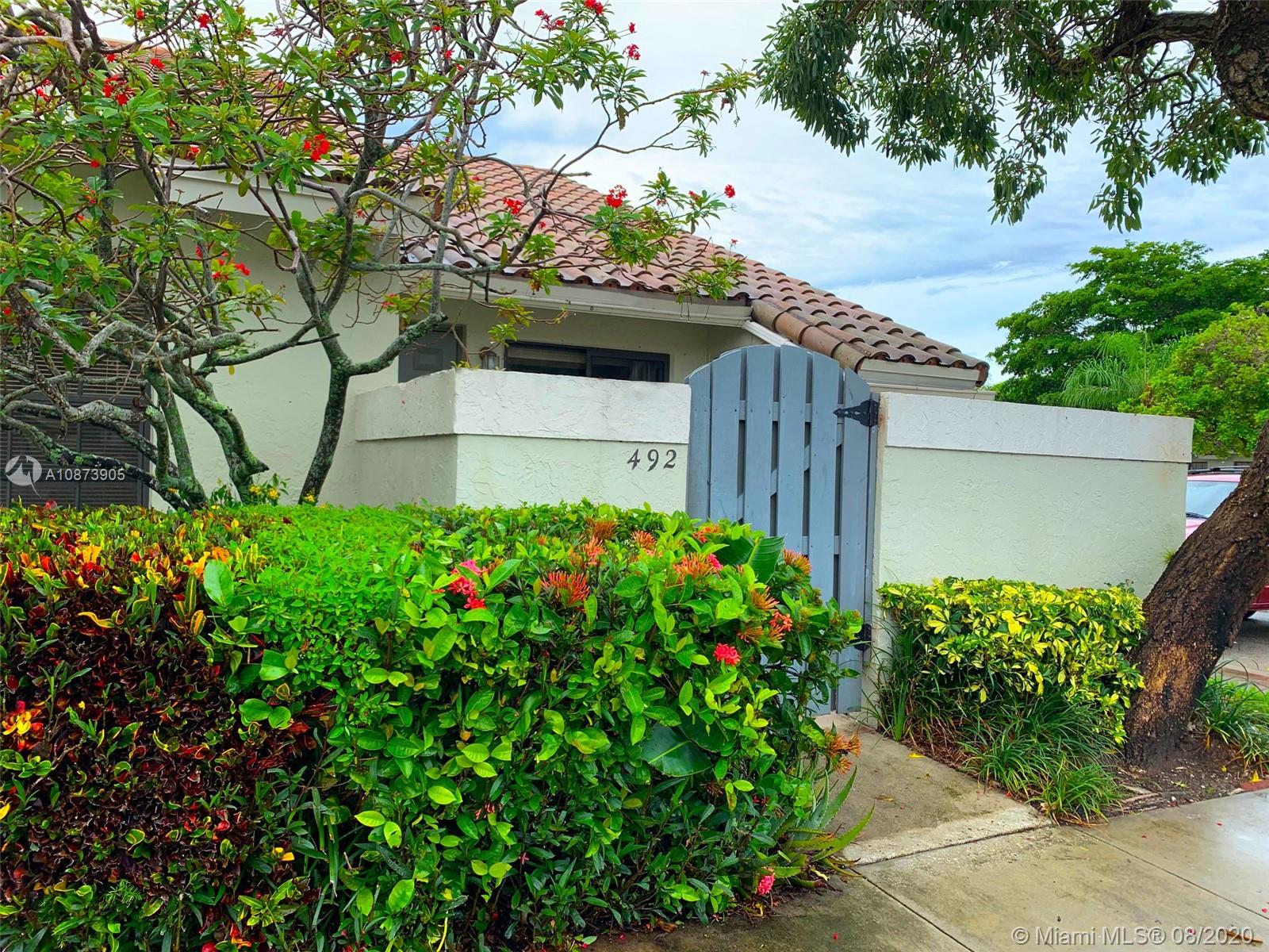 492 Hardwood Place, Unit 492 Boca Raton, FL 33431 - Photo 2 of 21 a picture of flowers