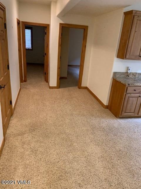 40 Rawhide Road, Unit E Edwards, CO 81632 - Photo 16 of 24 Lower Level Bedroom Doors