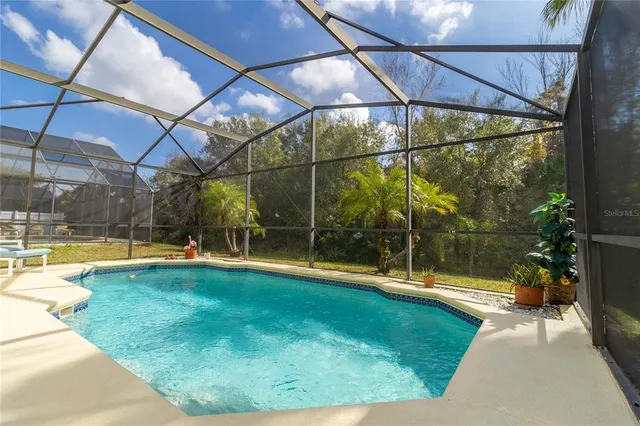 a view of yard with a patio