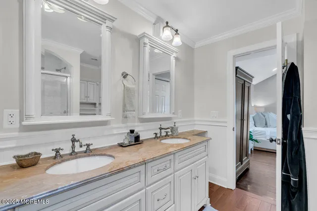 a front view of a house with a garden and yard