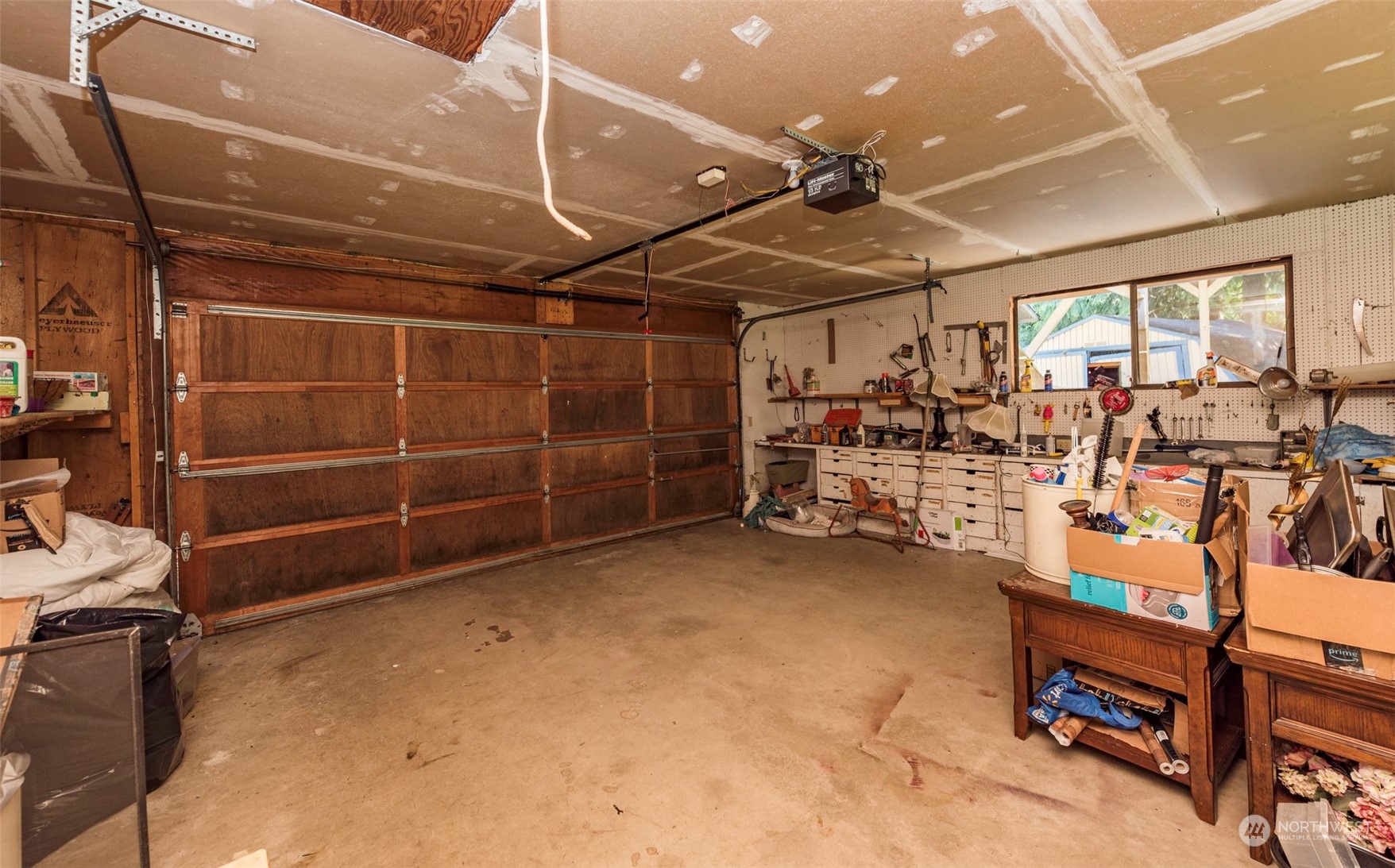 306 Webb Road Sequim, WA 98382 - Photo 26 of 40 a view of a room with gym equipment
