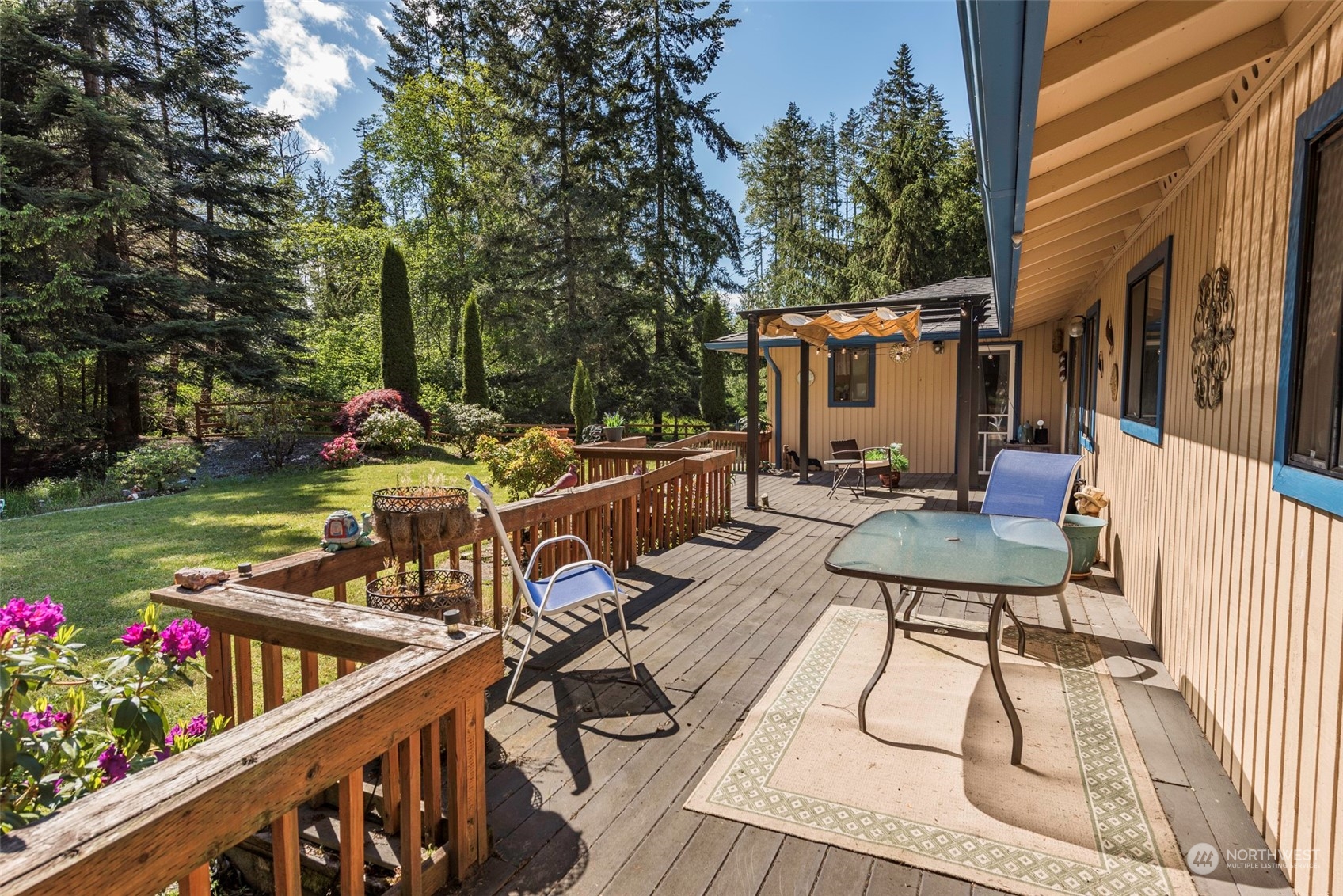 306 Webb Road Sequim, WA 98382 - Photo 29 of 40 a view of a table and chairs in patio