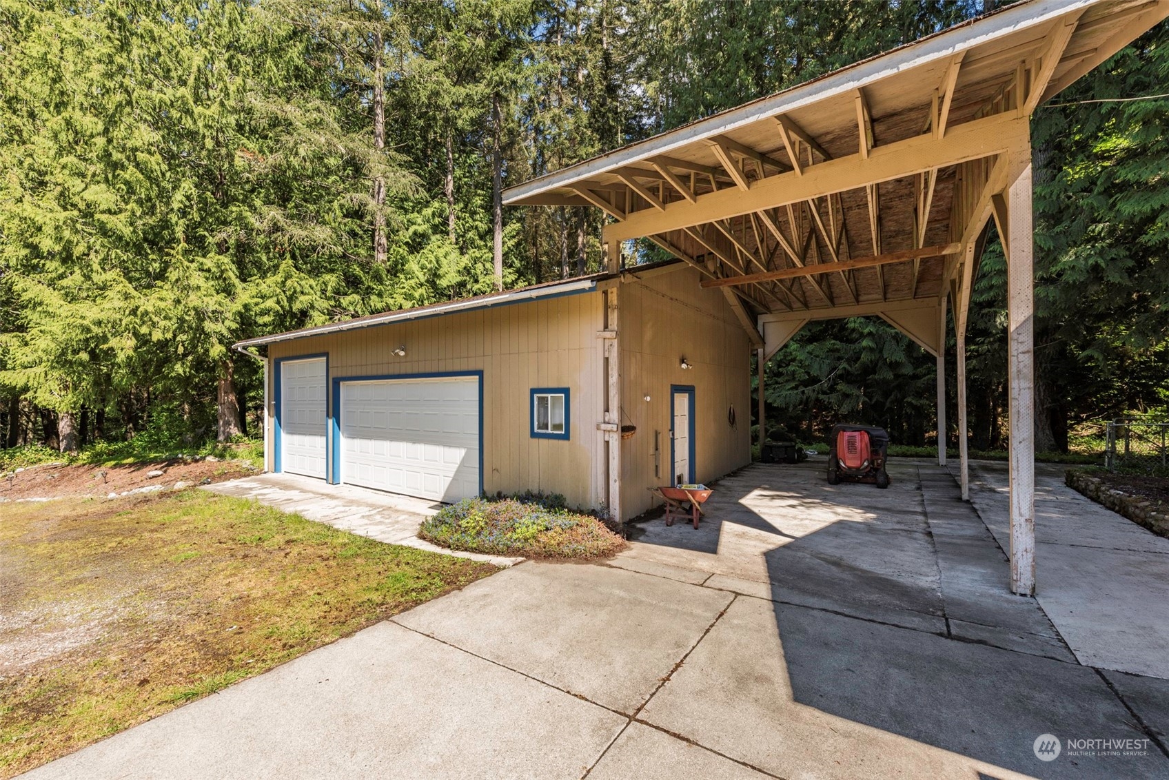 306 Webb Road Sequim, WA 98382 - Photo 36 of 40 a backyard of a house with seating space
