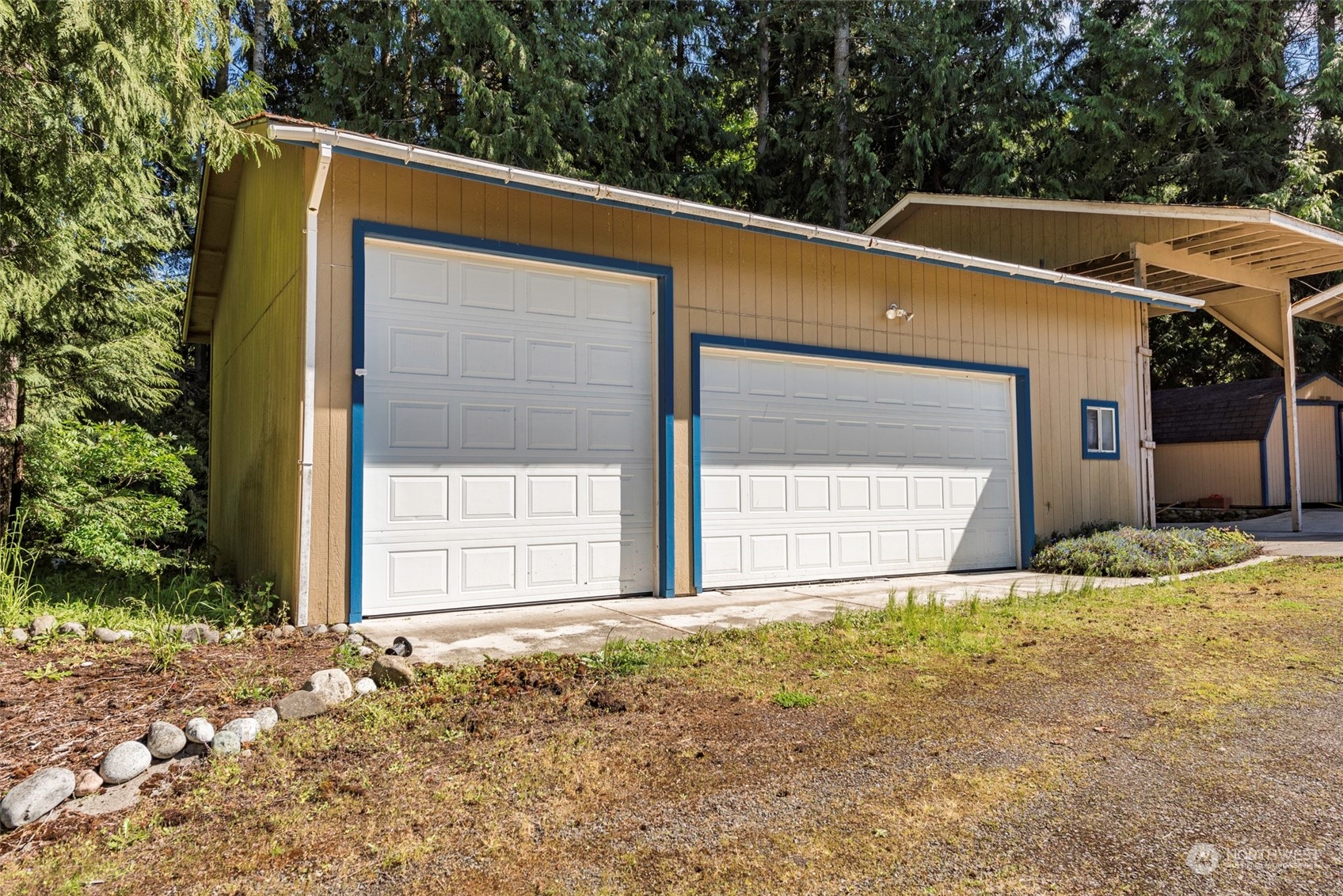 306 Webb Road Sequim, WA 98382 - Photo 37 of 40 a front view of a house with a yard