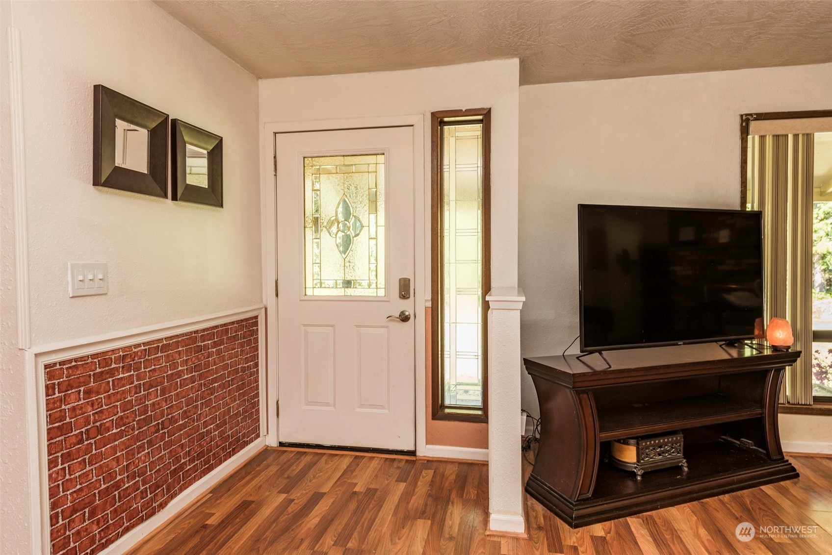 306 Webb Road Sequim, WA 98382 - Photo 4 of 40 a living room with furniture and a flat screen tv
