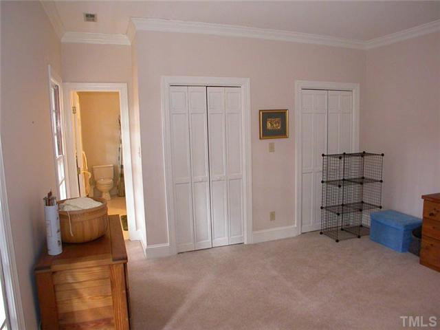 10769 Trego Trail Raleigh, NC 27614 - Photo 16 of 25 Large 2nd floor bedroom with double closets and private bathroom. Bedroom