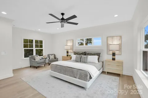 a bedroom with a bed and furniture