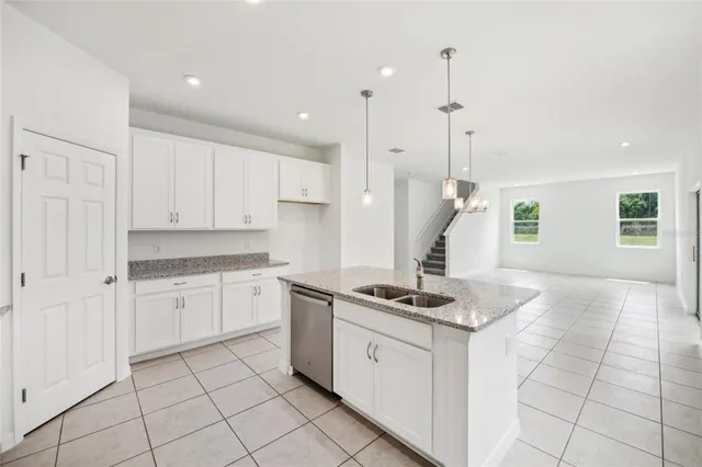 $390,560 | 12983 Trovita Drive, Grand Island, FL 32735