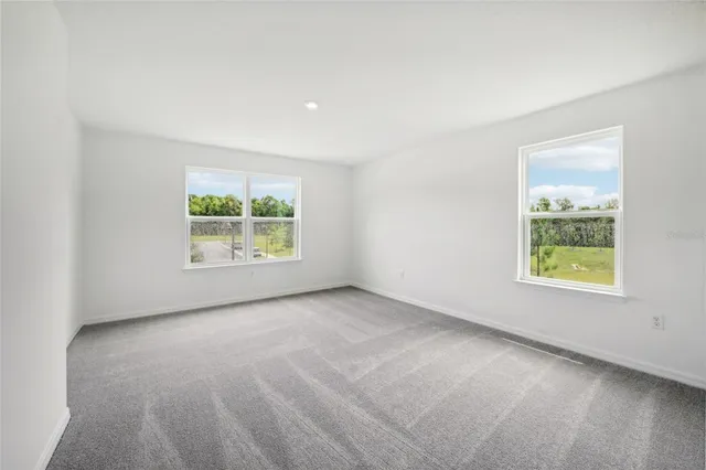 $390,560 | 12983 Trovita Drive, Grand Island, FL 32735