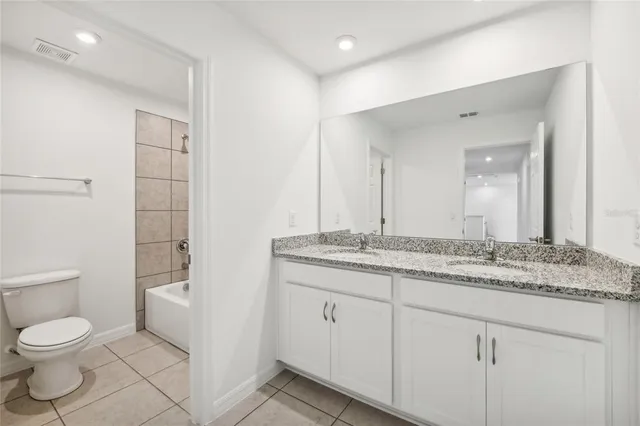 $390,560 | 12983 Trovita Drive, Grand Island, FL 32735