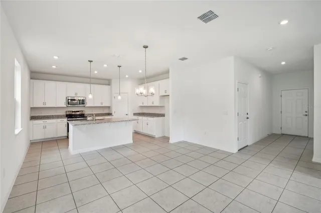 $390,560 | 12983 Trovita Drive, Grand Island, FL 32735