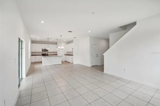 $390,560 | 12983 Trovita Drive, Grand Island, FL 32735