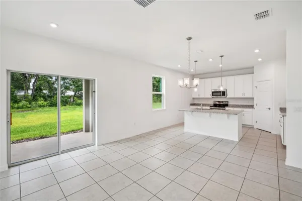 $386,960 | 12983 Trovita Drive, Grand Island, FL 32735