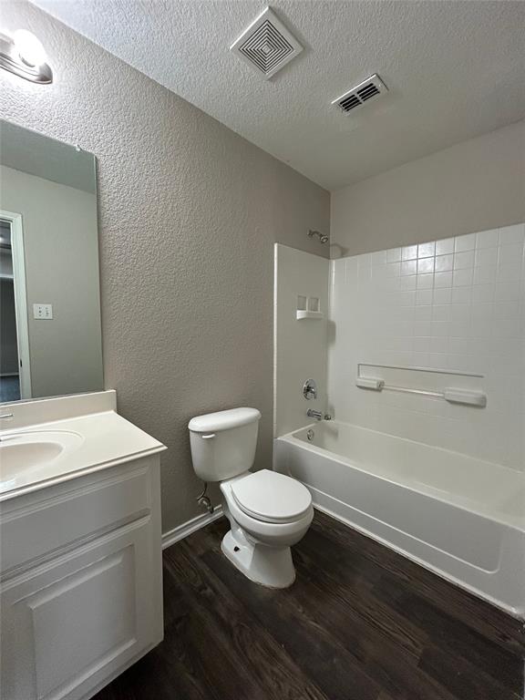 1249 Round Pen Run Fort Worth, TX 76052 - Photo 18 of 28 a bathroom with a toilet a sink and a bathtub