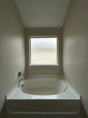 a bathroom with a bathtub
