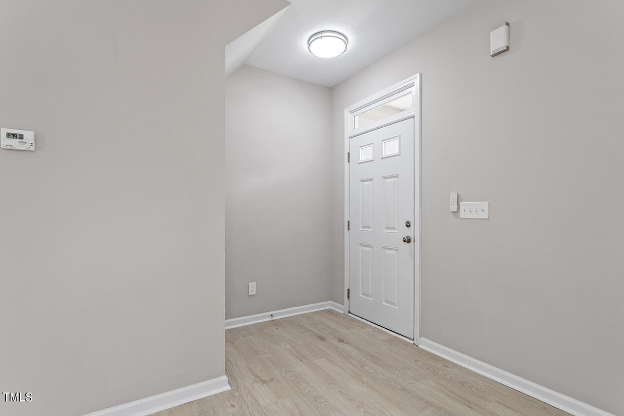 617 McCarthy Drive Clayton, NC 27527 - Photo 14 of 44 a view of an empty room