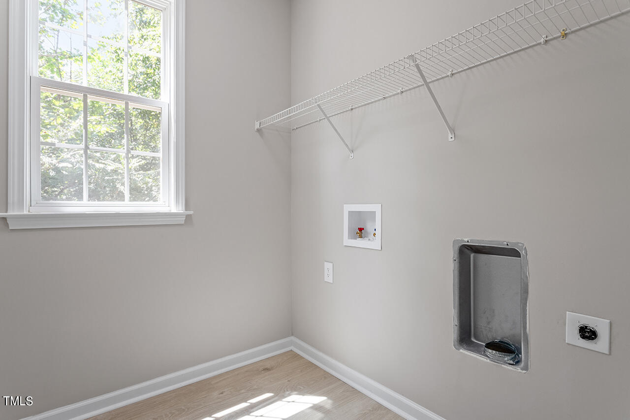 617 McCarthy Drive Clayton, NC 27527 - Photo 24 of 44 an empty room with a window