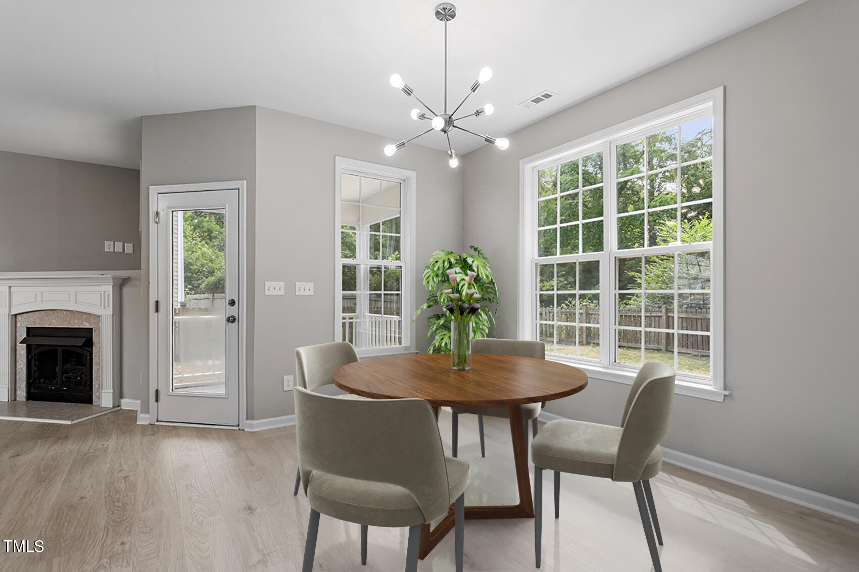 617 McCarthy Drive Clayton, NC 27527 - Photo 6 of 44 a dining room with furniture window and wooden floor