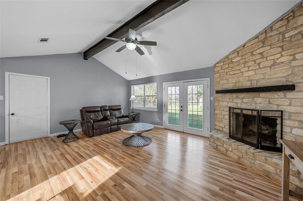 711 Rosedale Drive Hewitt, TX 76643 - Photo 2 of 16 a living room with furniture and a fireplace