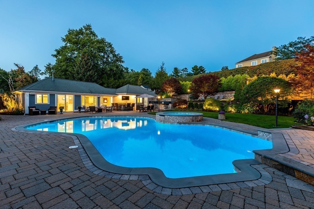 9 Anna Drive Danvers, MA 01923 - Photo 3 of 3 a view of a swimming pool and lounge chairs