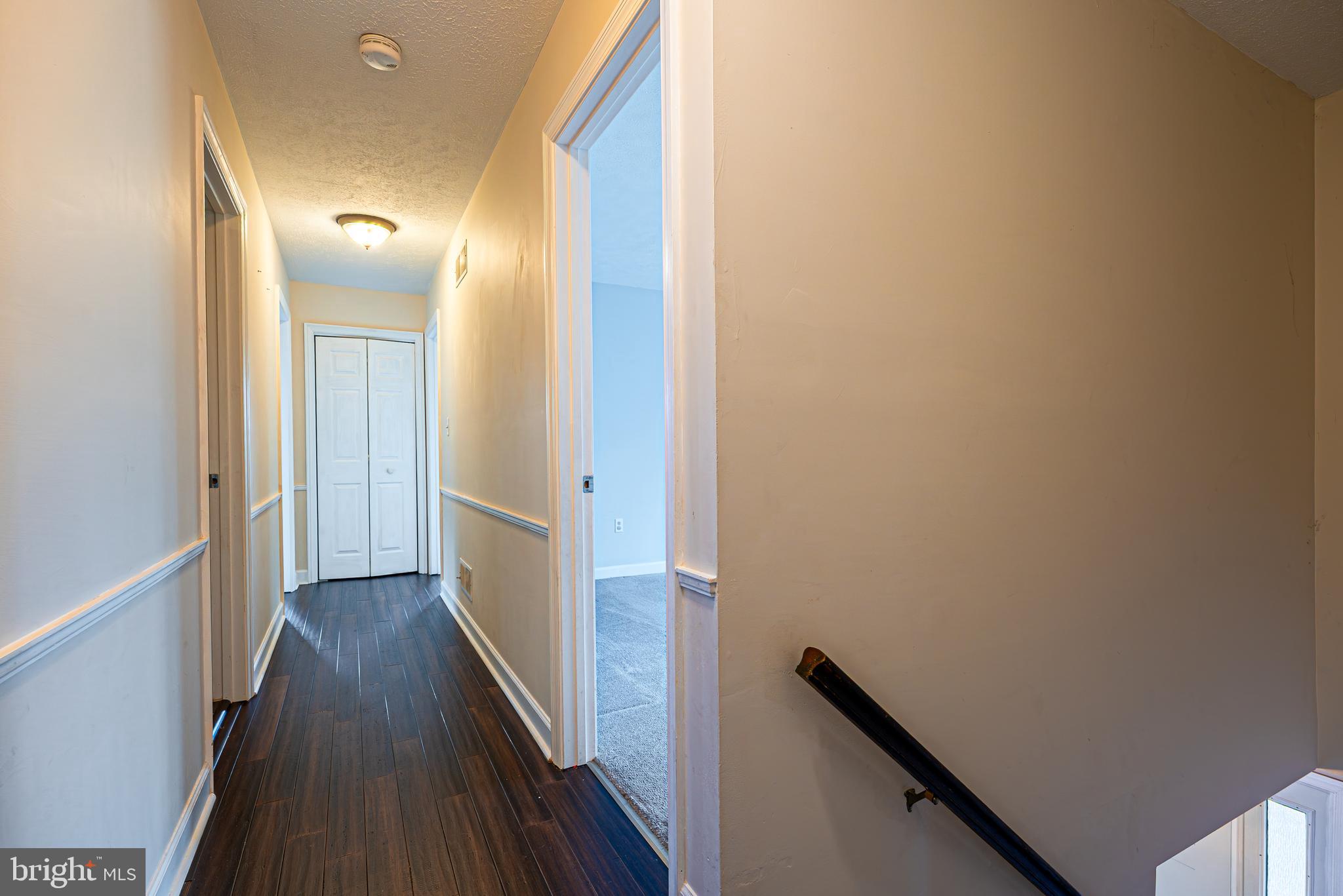 15117 Trail Ridge Road Southwest Cumberland, MD 21502 - Photo 22 of 43 a view of a hallway with wooden floor