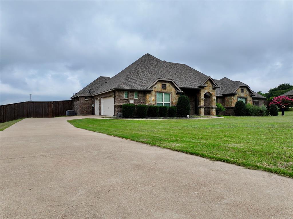 6621 Singleton Road Midlothian, TX 76065 - Photo 32 of 32 3-car garage.