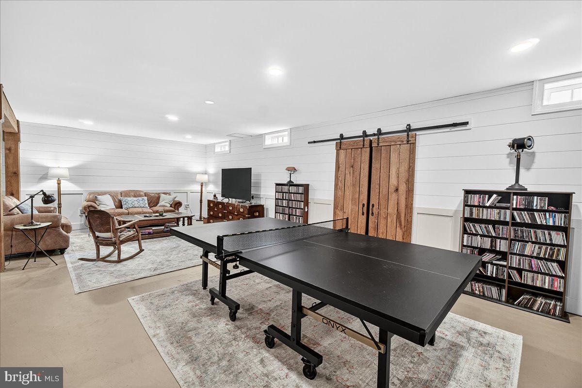 9522 Bessie Clemson Road Union Bridge, MD 21791 - Photo 65 of 107 a living room with furniture a rug and a table