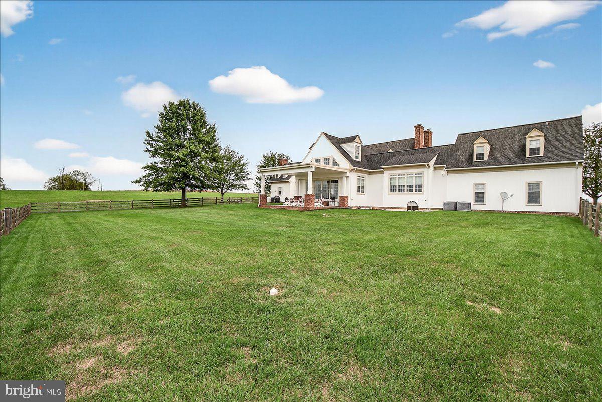9522 Bessie Clemson Road Union Bridge, MD 21791 - Photo 69 of 107 a view of a house with a big yard and large trees