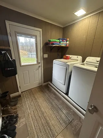 a bathroom with a sink vanity and mirror