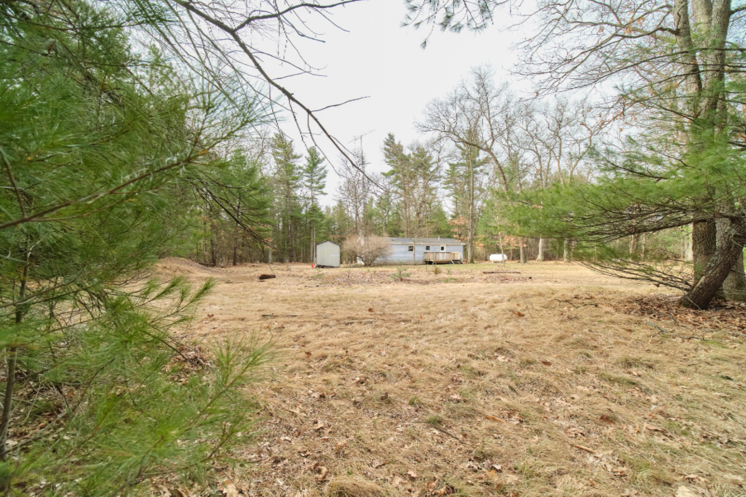 2230 Raymond Road Twin Lake, MI 49457 - Photo 12 of 47 Back of Property