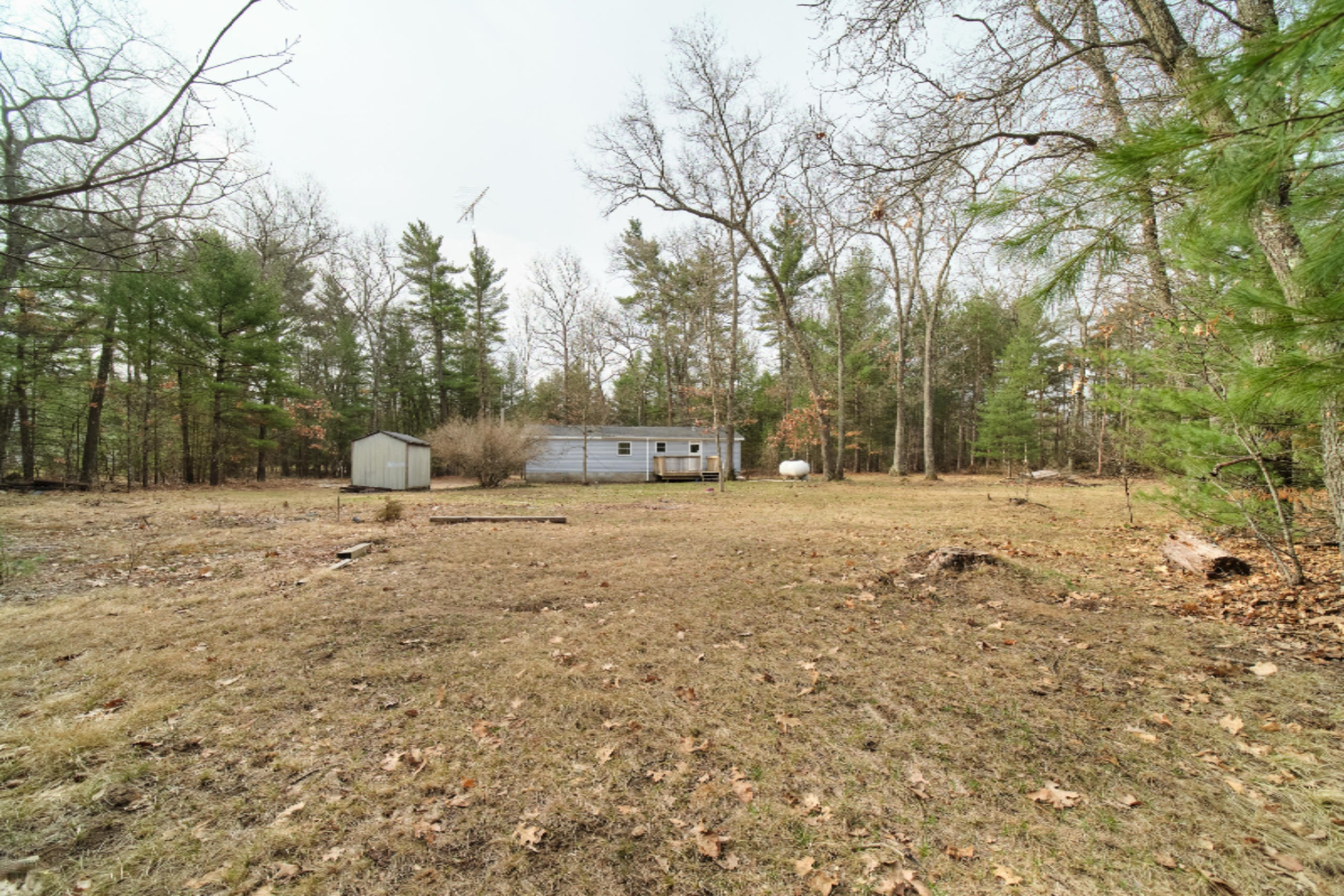 2230 Raymond Road Twin Lake, MI 49457 - Photo 13 of 47 Back of Property