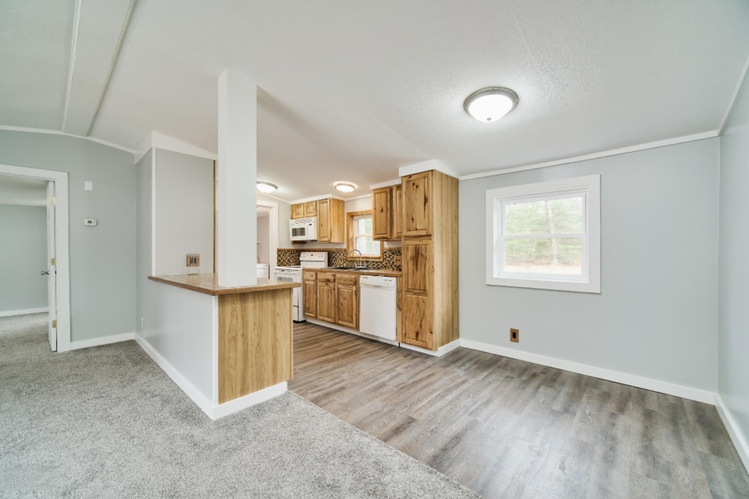2230 Raymond Road Twin Lake, MI 49457 - Photo 47 of 47 Open Floor Plan to Kitchen