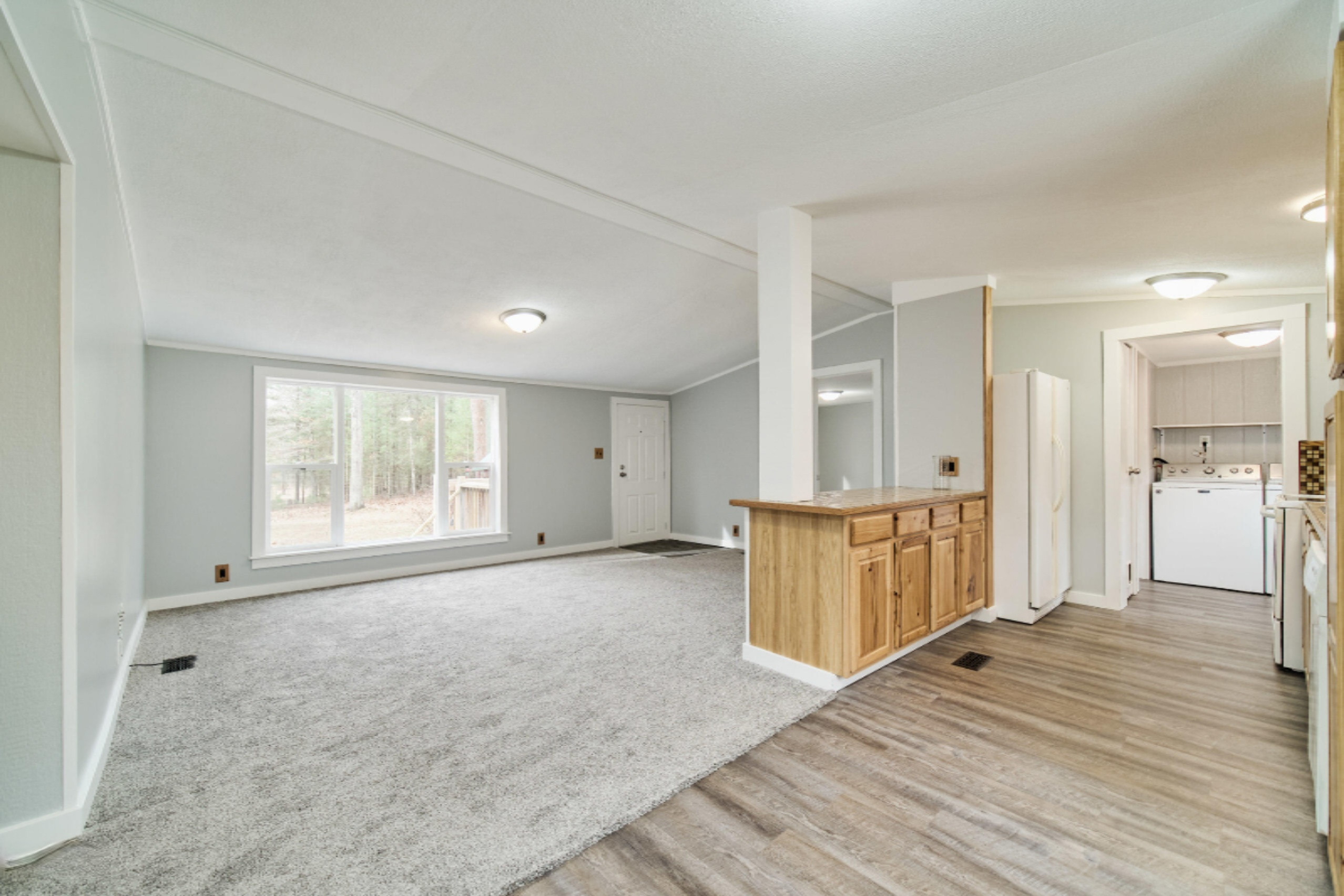 2230 Raymond Road Twin Lake, MI 49457 - Photo 22 of 47 Open Kitchen to Living Room