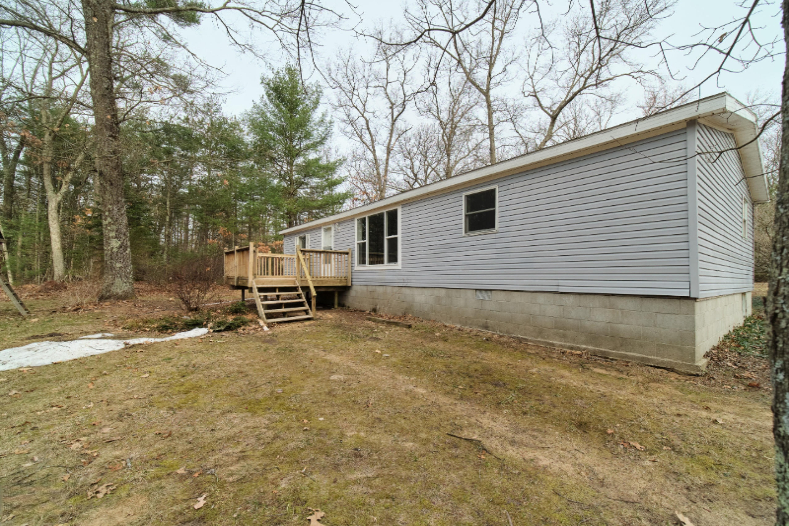 2230 Raymond Road Twin Lake, MI 49457 - Photo 4 of 47 Front of Home