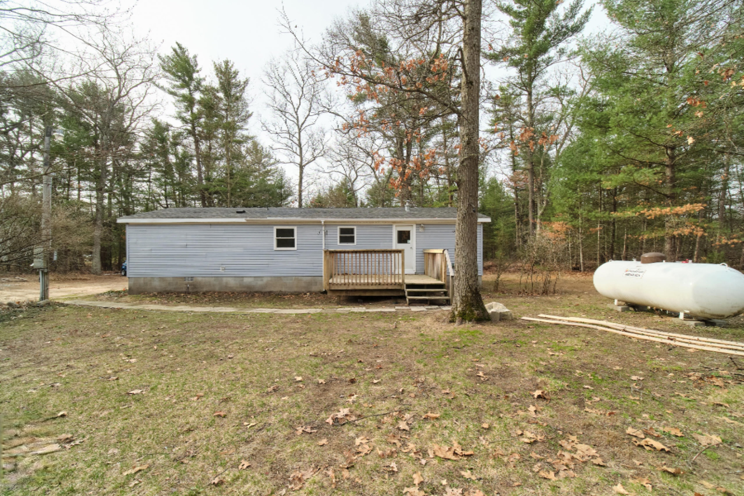 2230 Raymond Road Twin Lake, MI 49457 - Photo 7 of 47 Back of Home
