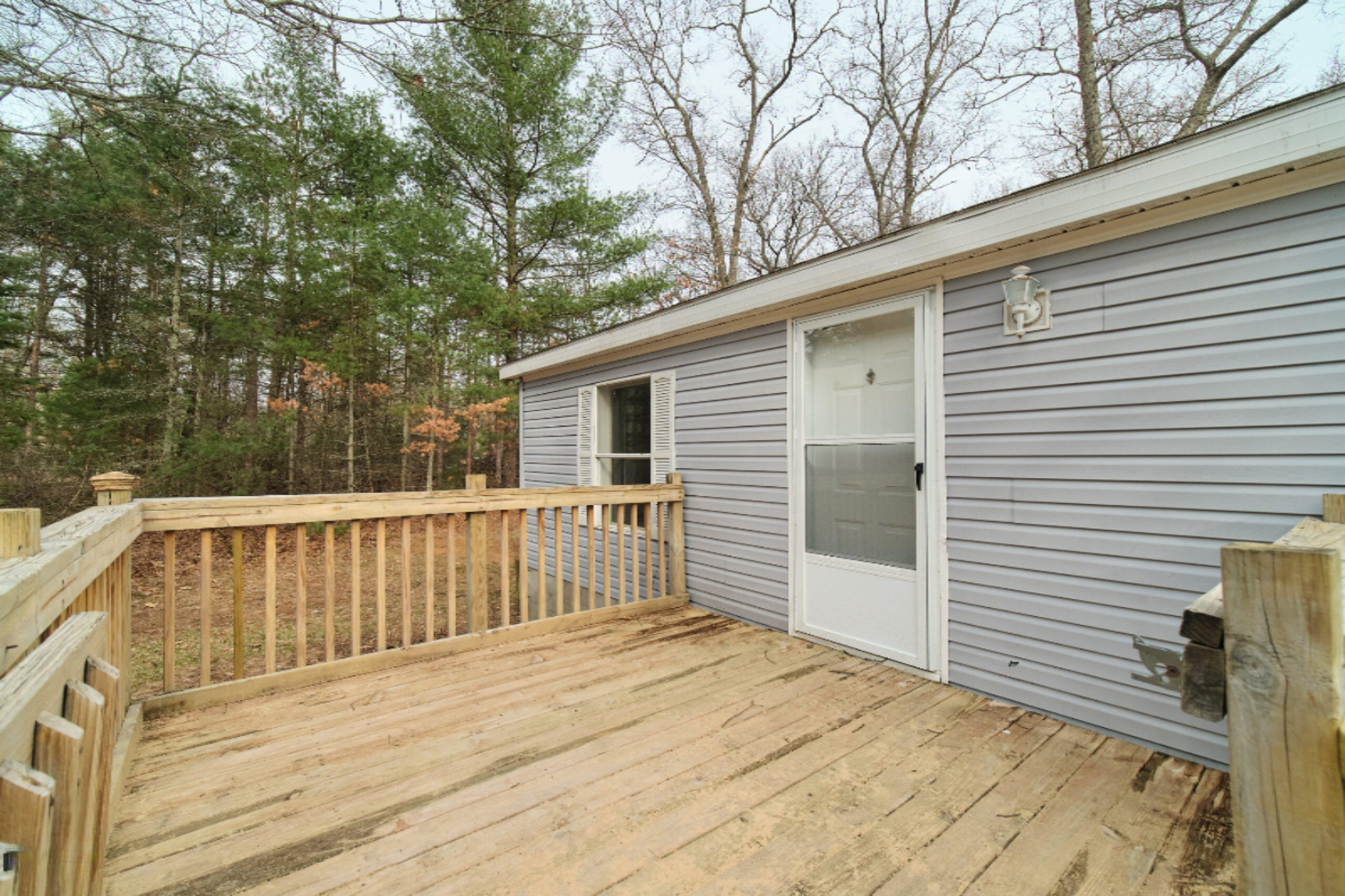 2230 Raymond Road Twin Lake, MI 49457 - Photo 8 of 47 Front Deck