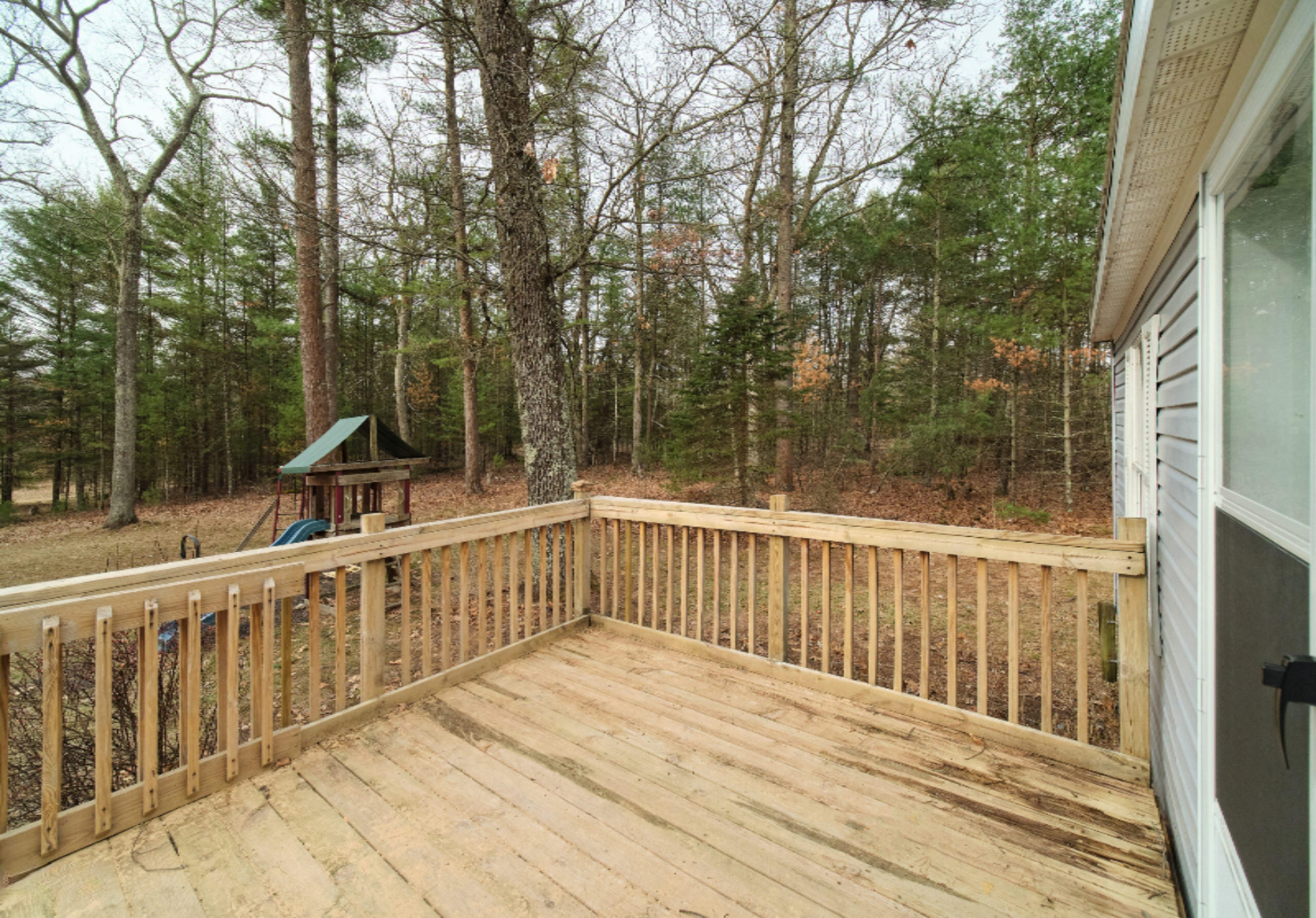 2230 Raymond Road Twin Lake, MI 49457 - Photo 9 of 47 Front Deck